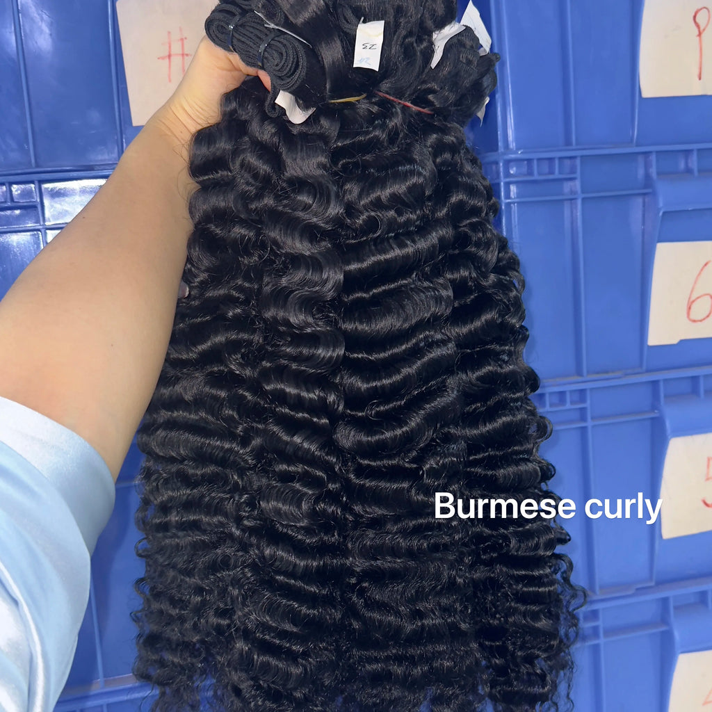 Raw Virgin Human Hair Bundles displayed showcasing Burmese curly texture for versatile styling.