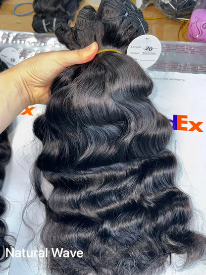 Raw Virgin Human Hair Bundles displayed in natural wave texture, showcasing premium quality and versatility.